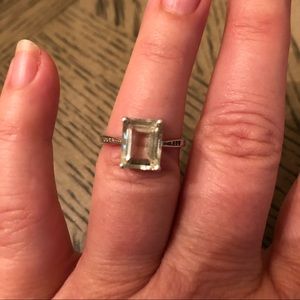 Light green peridot and diamond ring